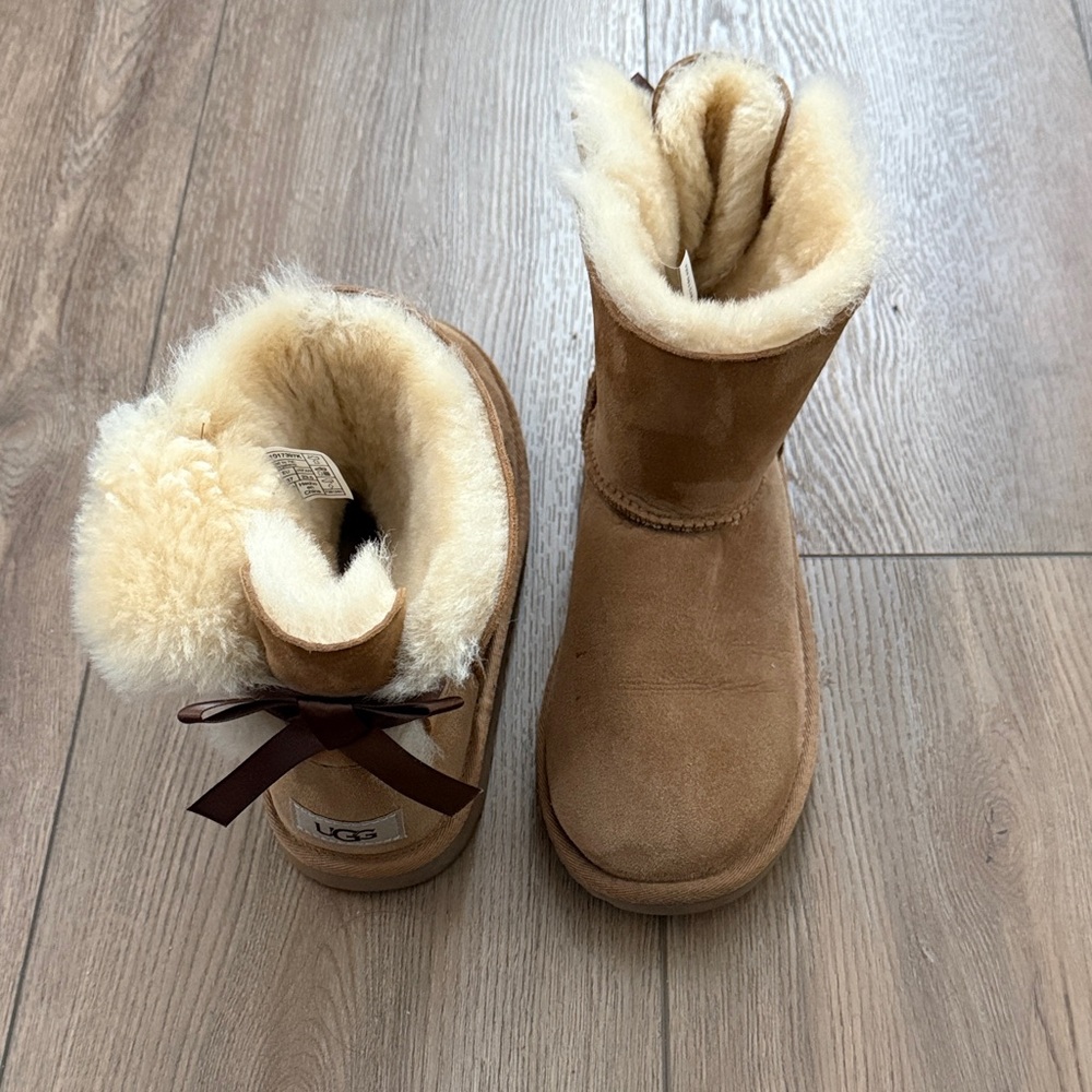 UGG Brown Sheepskin Boots with Ribbon. Big kid size 5.